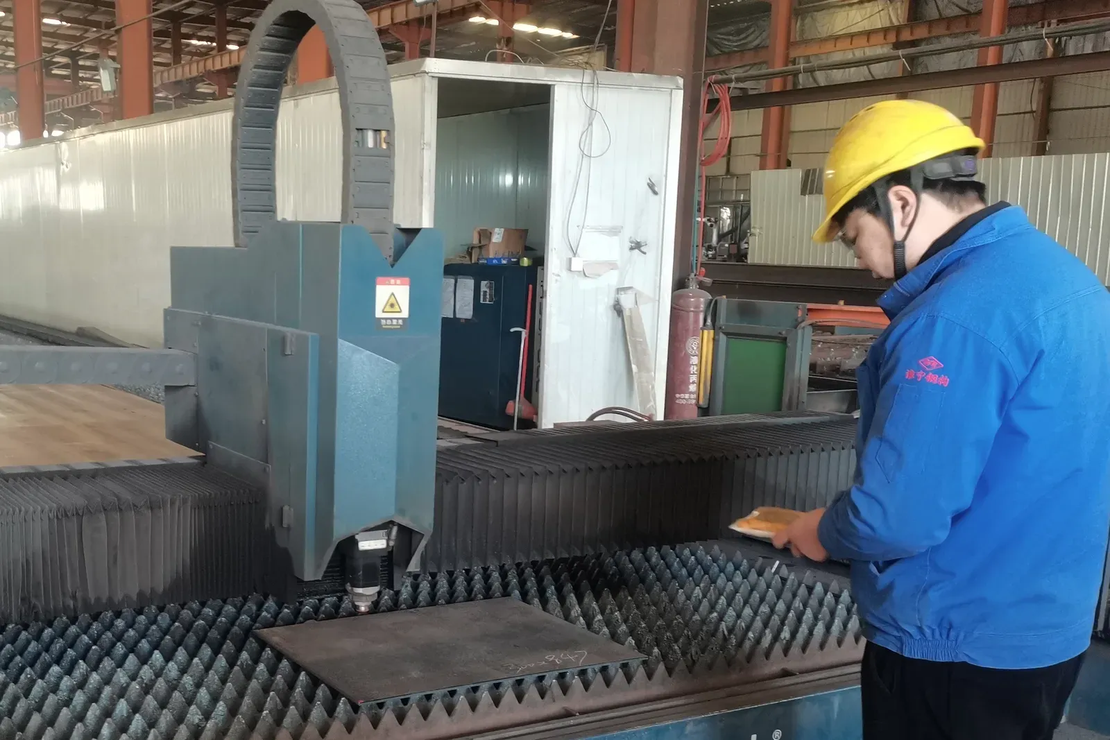 CNC plate cutting. Steel plate cut to your nested drawings on the CNC cutting bed.